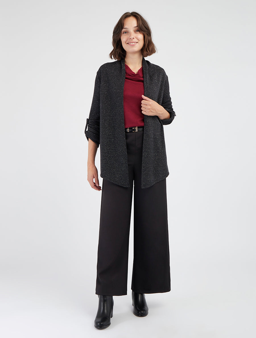 Chaleco liso irisado con mangas largas arremangables. - Negro