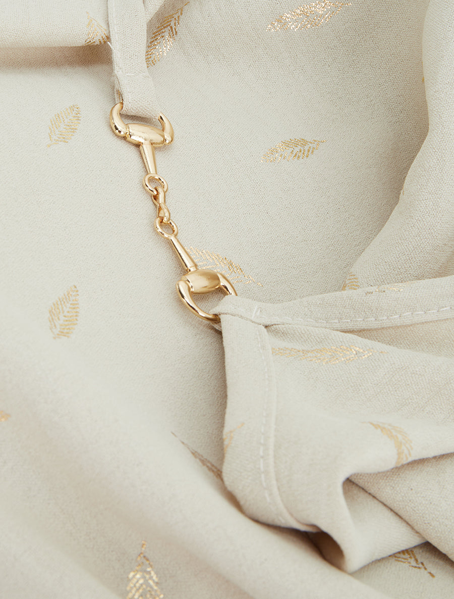 Camiseta de tirantes con joyas e impresión de plumas. - Beis