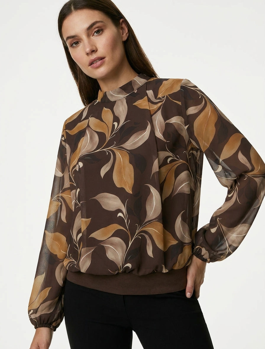 Blusa estampada de hojas con puños elásticos. - Marrón