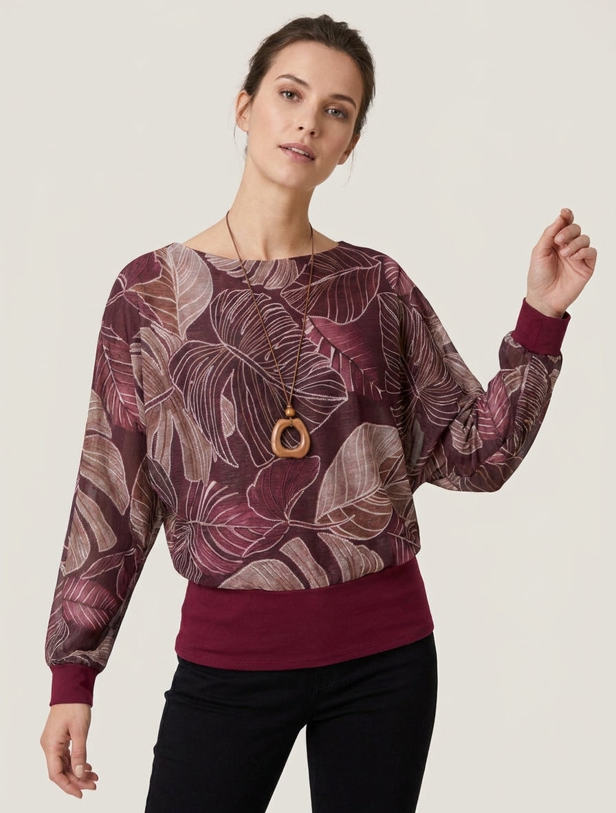 Top irisado con estampado tropical y mangas murciélago - Color vino
