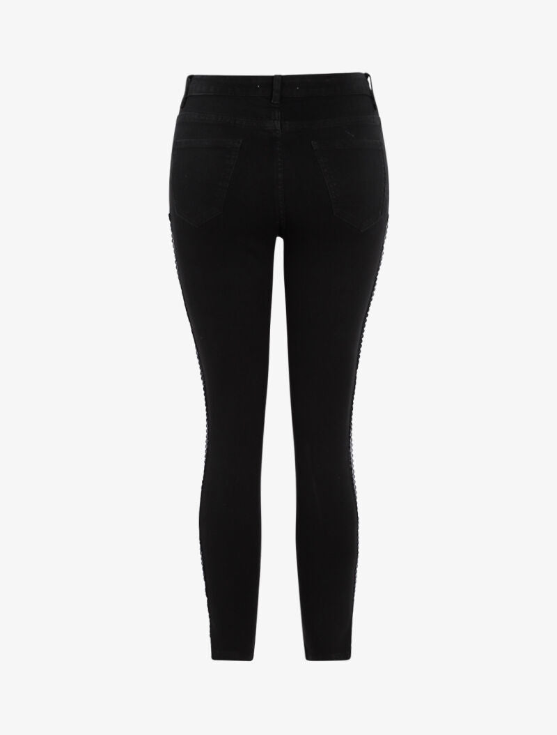 Jean 7/8 con bordados calados - negro