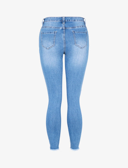 Jean 7/8 con rasgaduras - azul denim