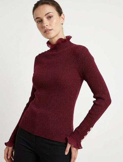 Suéter acanalado y brillante con cuello alto con volantes. - Burdeos