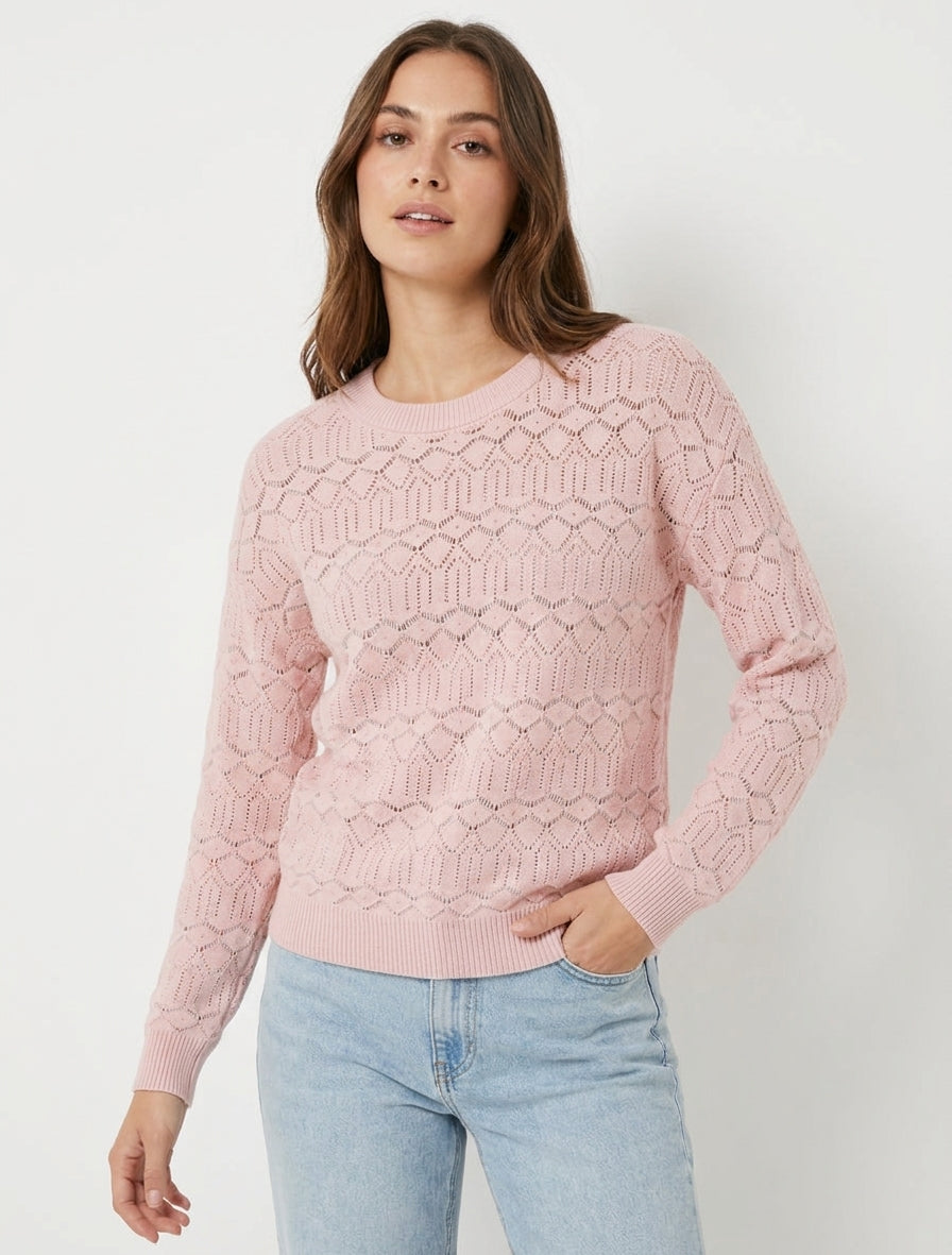 Jersey liso calado con cuello redondo. - Rosa