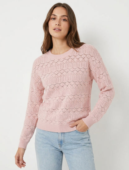 Jersey liso calado con cuello redondo. - Rosa