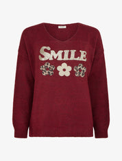 Suéter liso de punto con estampado. - Burdeos