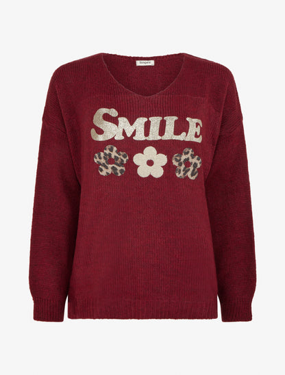 Suéter liso de punto con estampado. - Burdeos