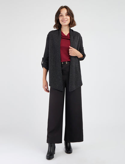 Chaleco liso irisado con mangas largas arremangables. - Negro
