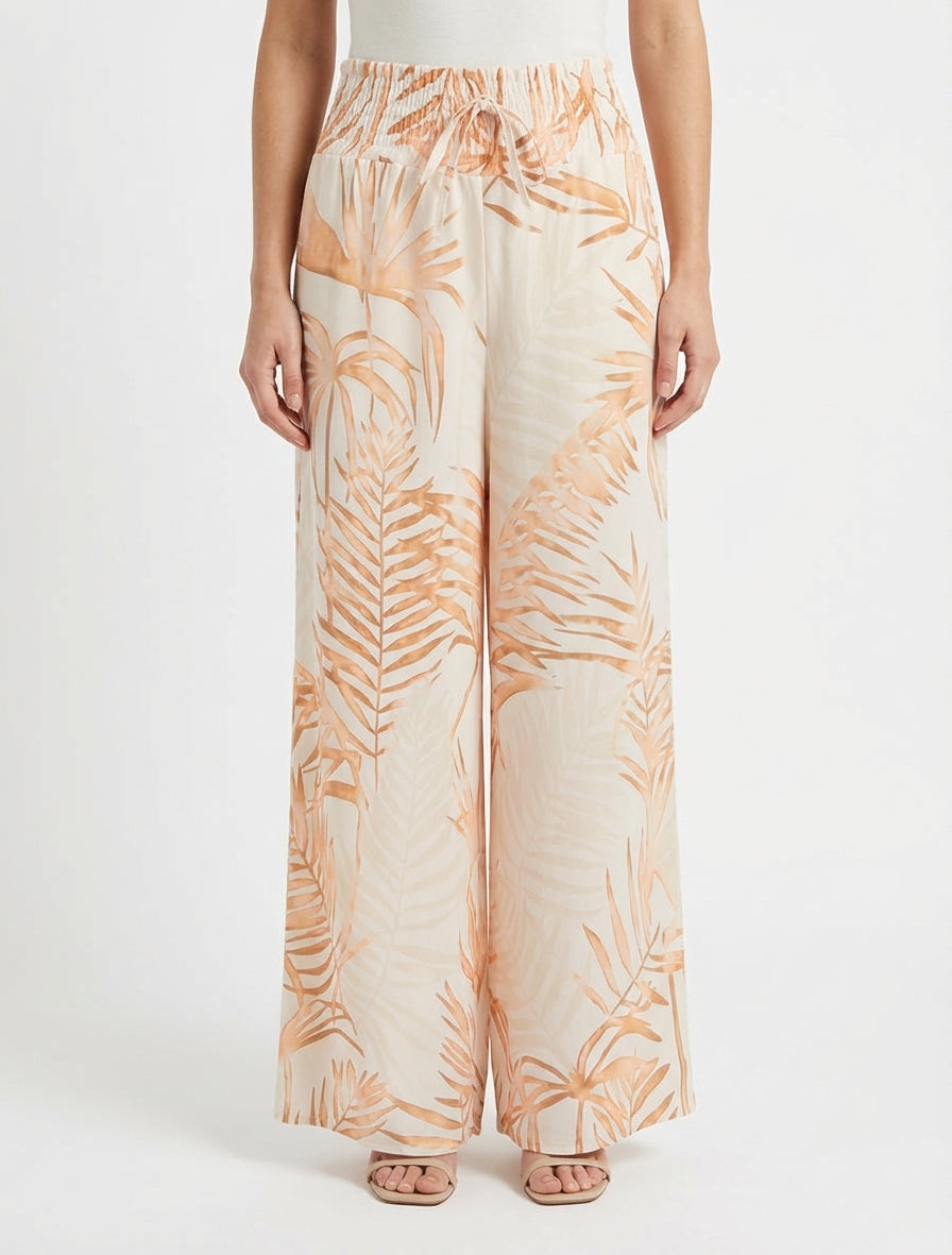 Pantalón estampado de hojas con cintura elástica. - Beis