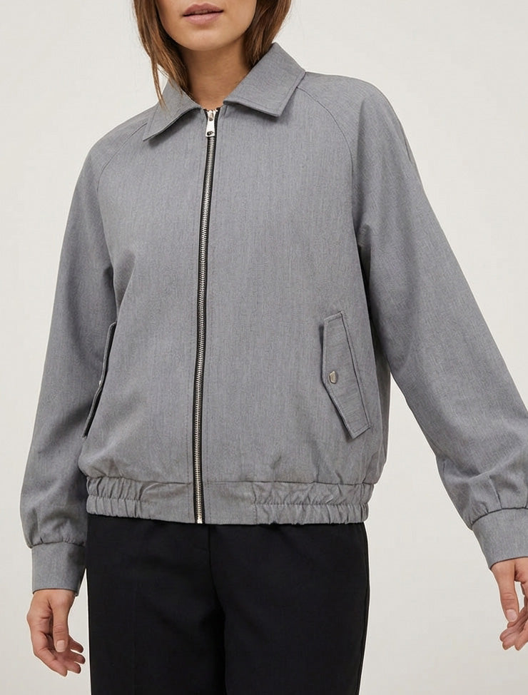 Chaqueta holgada con cremallera y bordes elásticos. - Gris