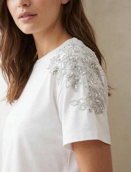 Camiseta de manga corta con hombros adornados con strass. - Blanco