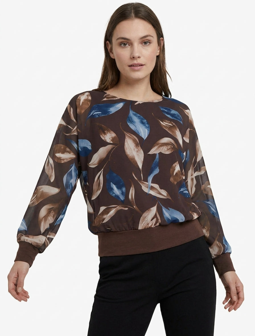 Top con estampado de hojas y mangas murciélago. - Marrón