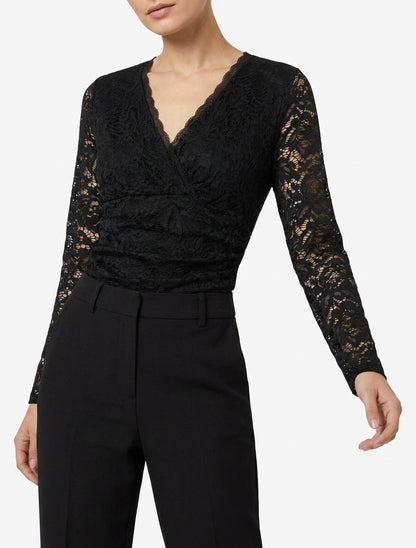Body de encaje con mangas largas y cuello cruzado. - Negro