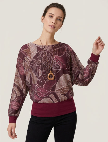 Top irisado con estampado tropical y mangas murciélago - Color vino