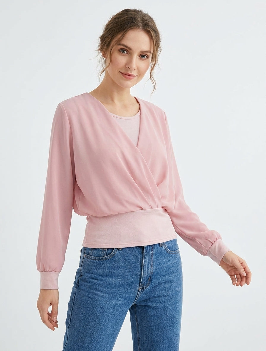 Top con mangas estilo murciélago y paneles cruzados. - Rosa